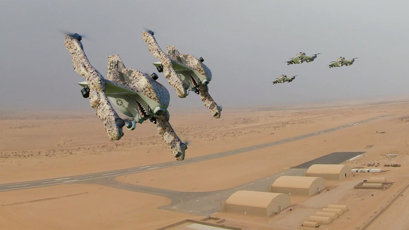 Recruit drones in desert configuration flying over an arid airfield environment.